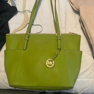 Green Michael kors purse never used.